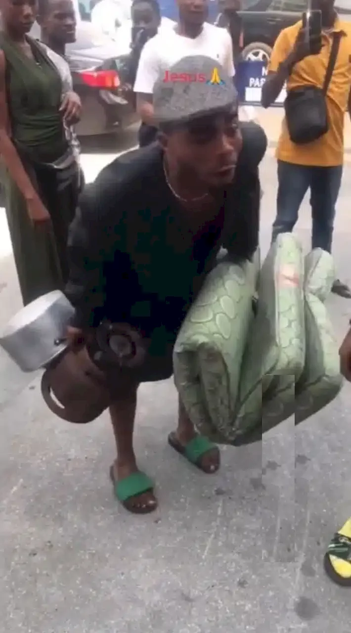 Man relocates belongings to bank amidst new Naira notes scarcity (Video)