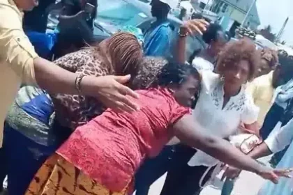 Drama as lady goes into labour while queuing for cash at bank in Port Harcourt (Video)