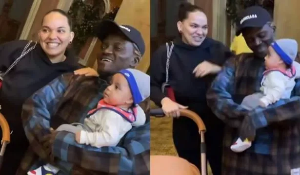 Moment caucasian lady requests for photo with Portable, asks him to carry her baby
