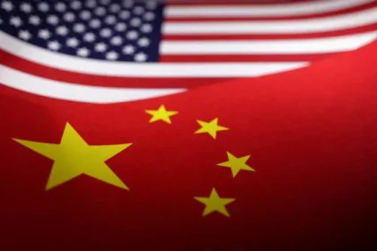 Illustration shows U.S. and Chinese flags