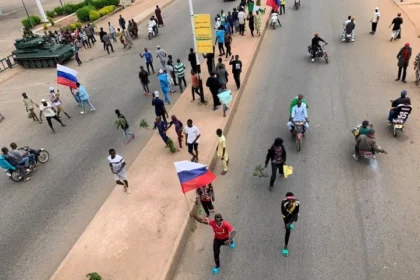 #EndBadGovernance Protesters Call for Help as Russian, Japanese Flags Spotted in Jos (Pictures)