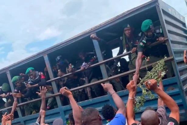 Reactions Trail Photo Of Policemen Shaking Some Protesters Who Were Hailing Them From Their Vehicle