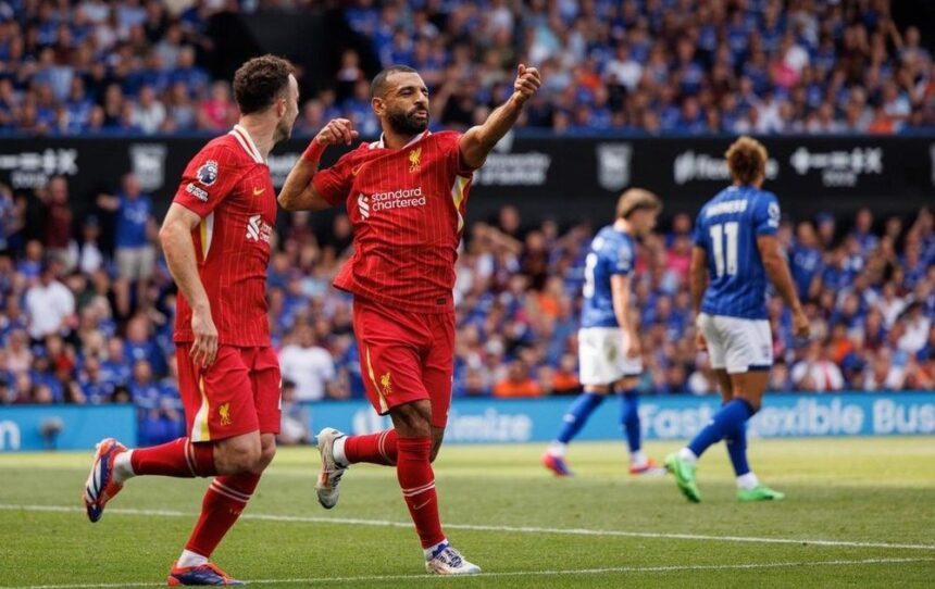 Liverpool beat Chelsea 2-1 to go top of premier league