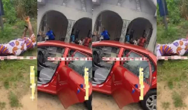 Nigerian woman rolls on the ground as son gifts her a brand-new car (video)